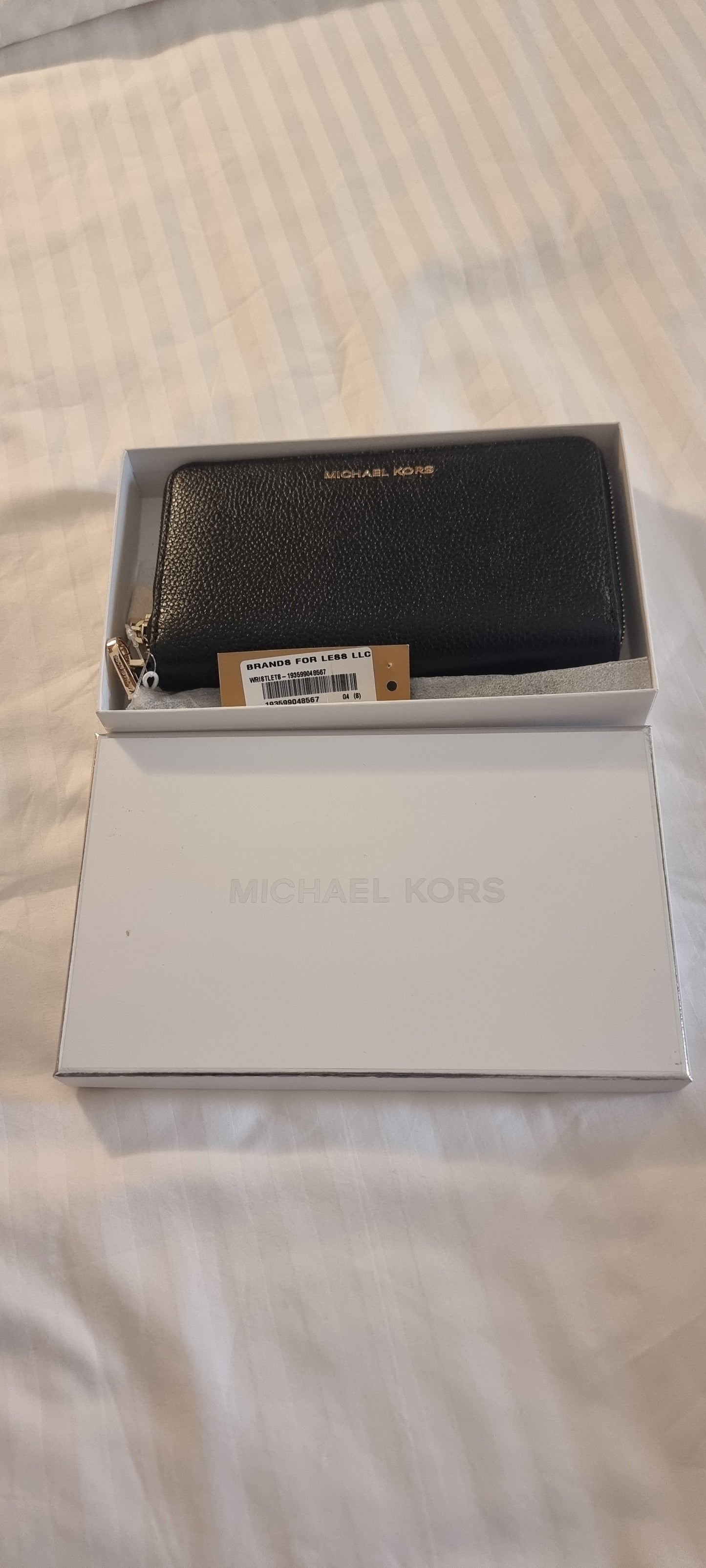 Michael Kors Jet Set Pebble leather Continental Wristlet